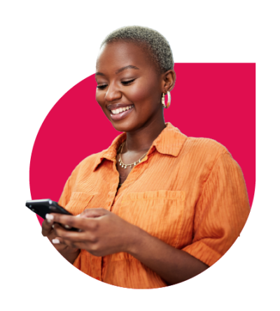 A guest smiling while RSVPing on her phone